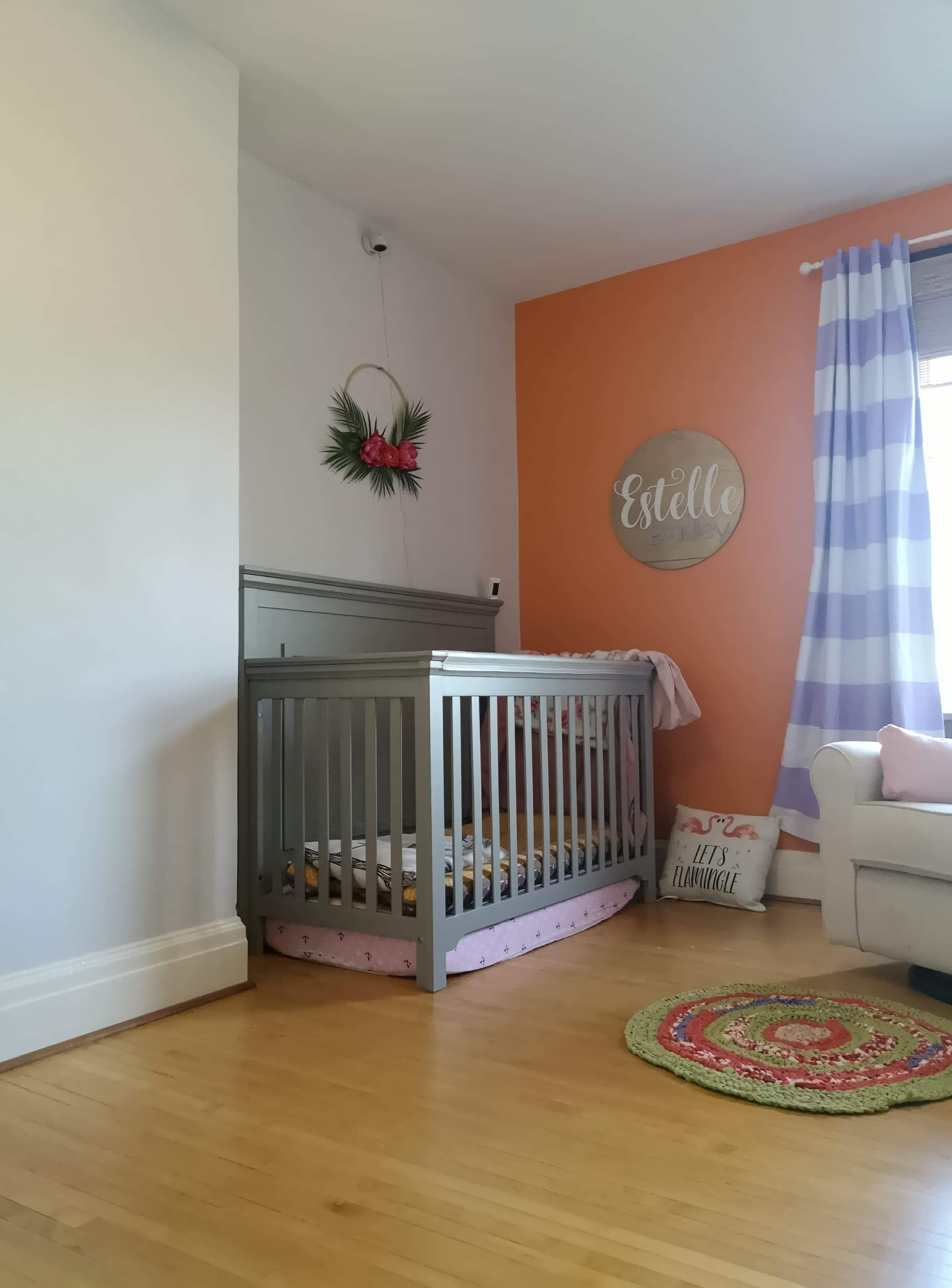 Freshly painted bedroom with an orange accent wall