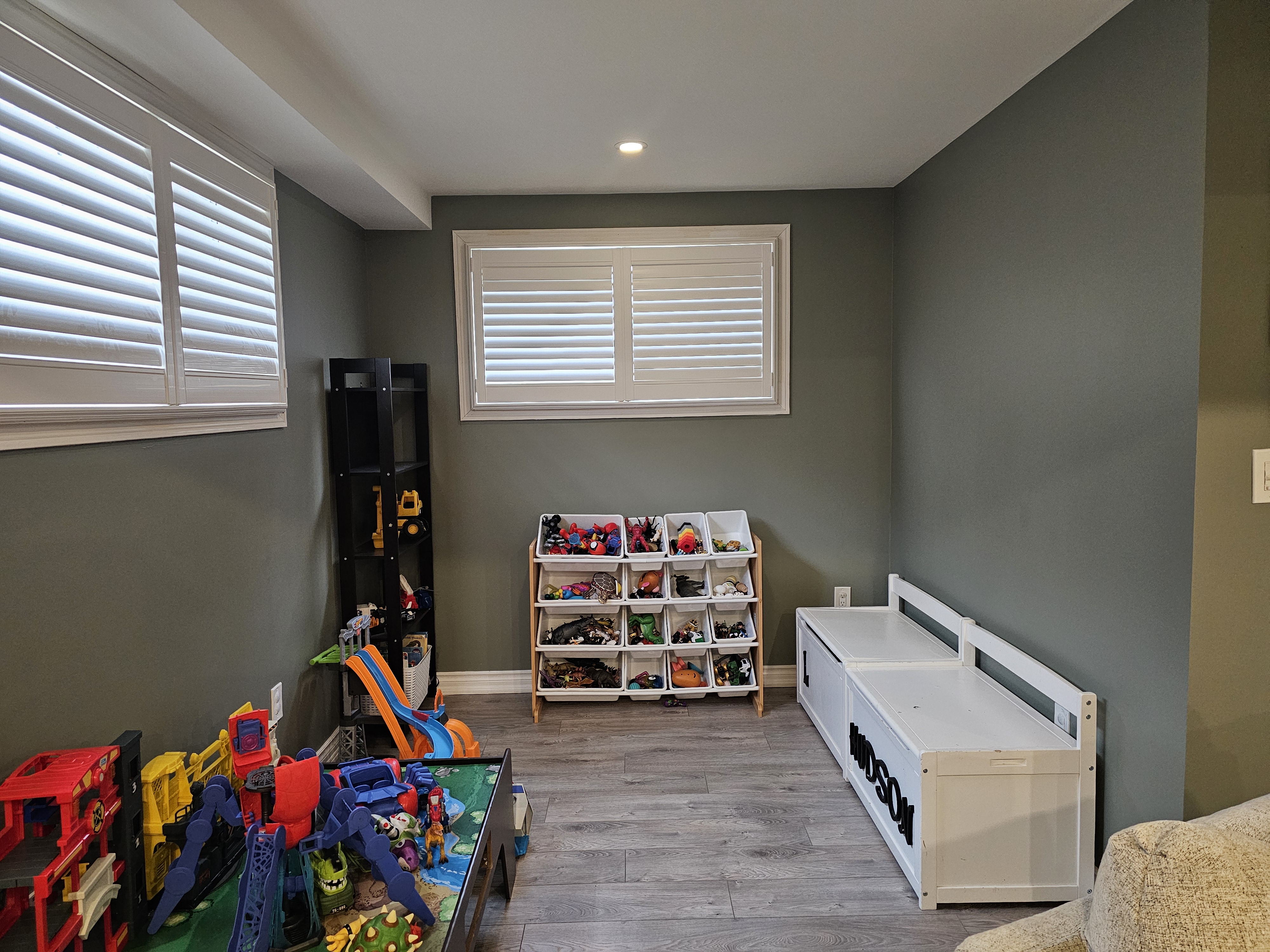 freshly painted basement playroom in green